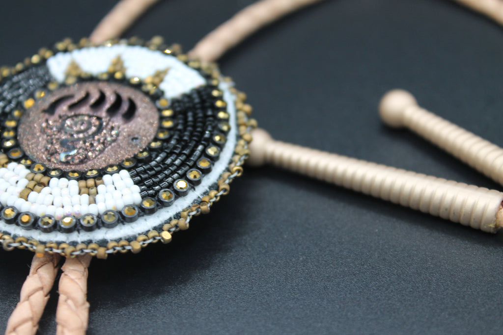 Bear paw bolo tie