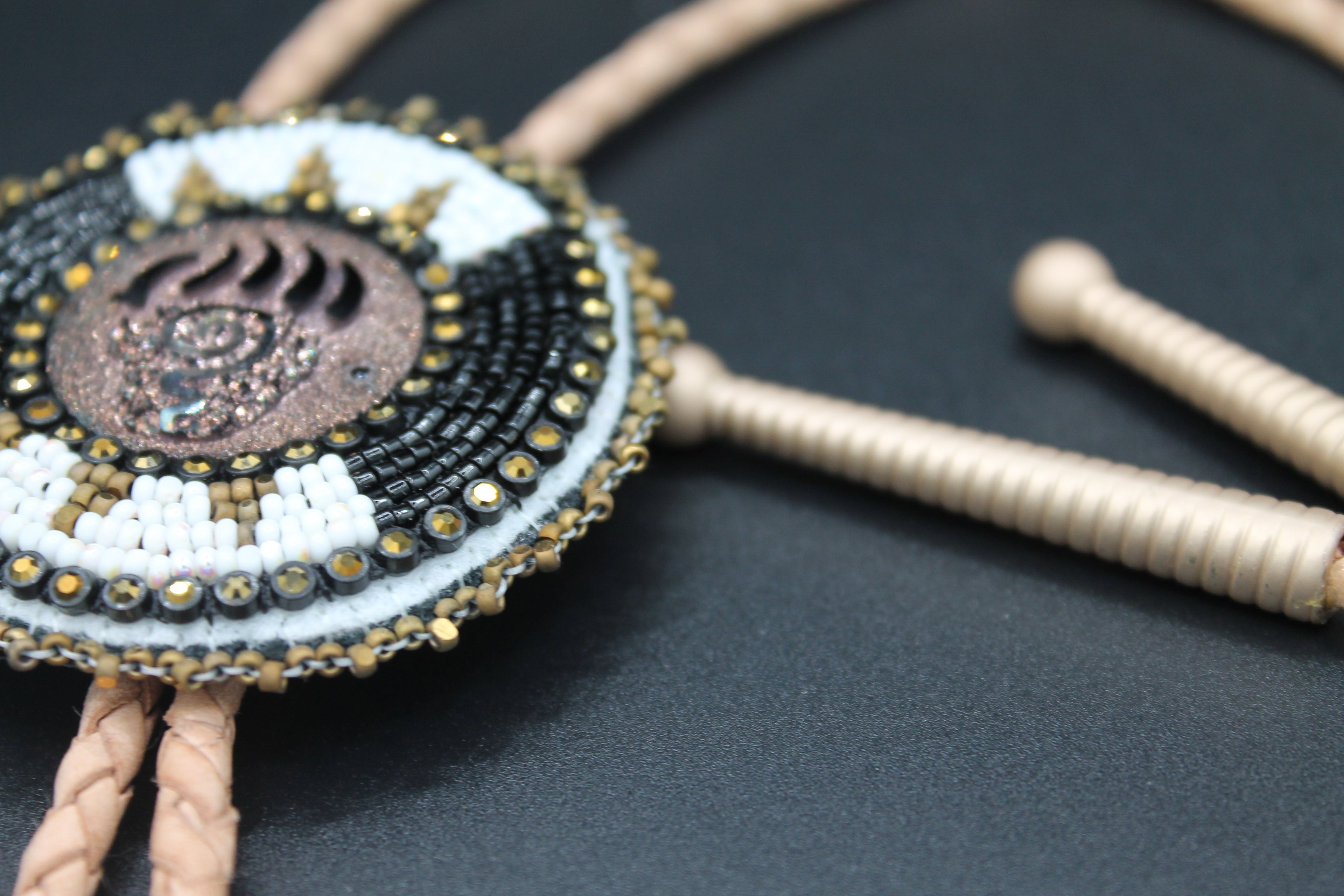 Bear paw bolo tie