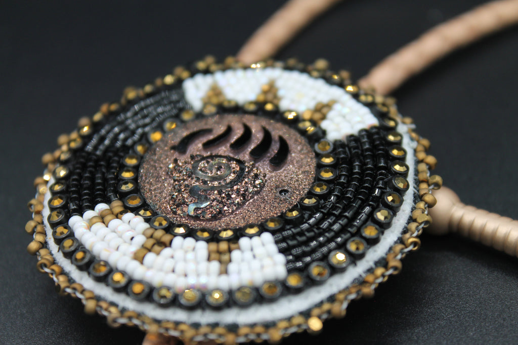 Bear paw bolo tie