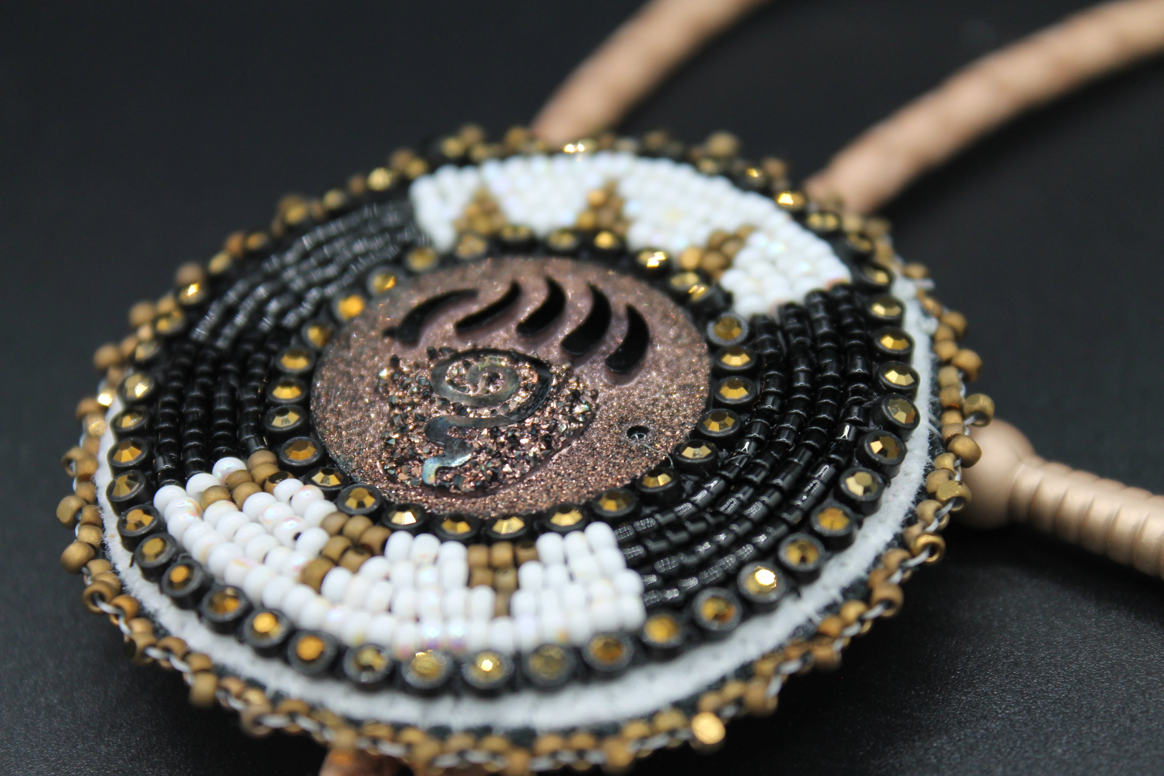 Bear paw bolo tie