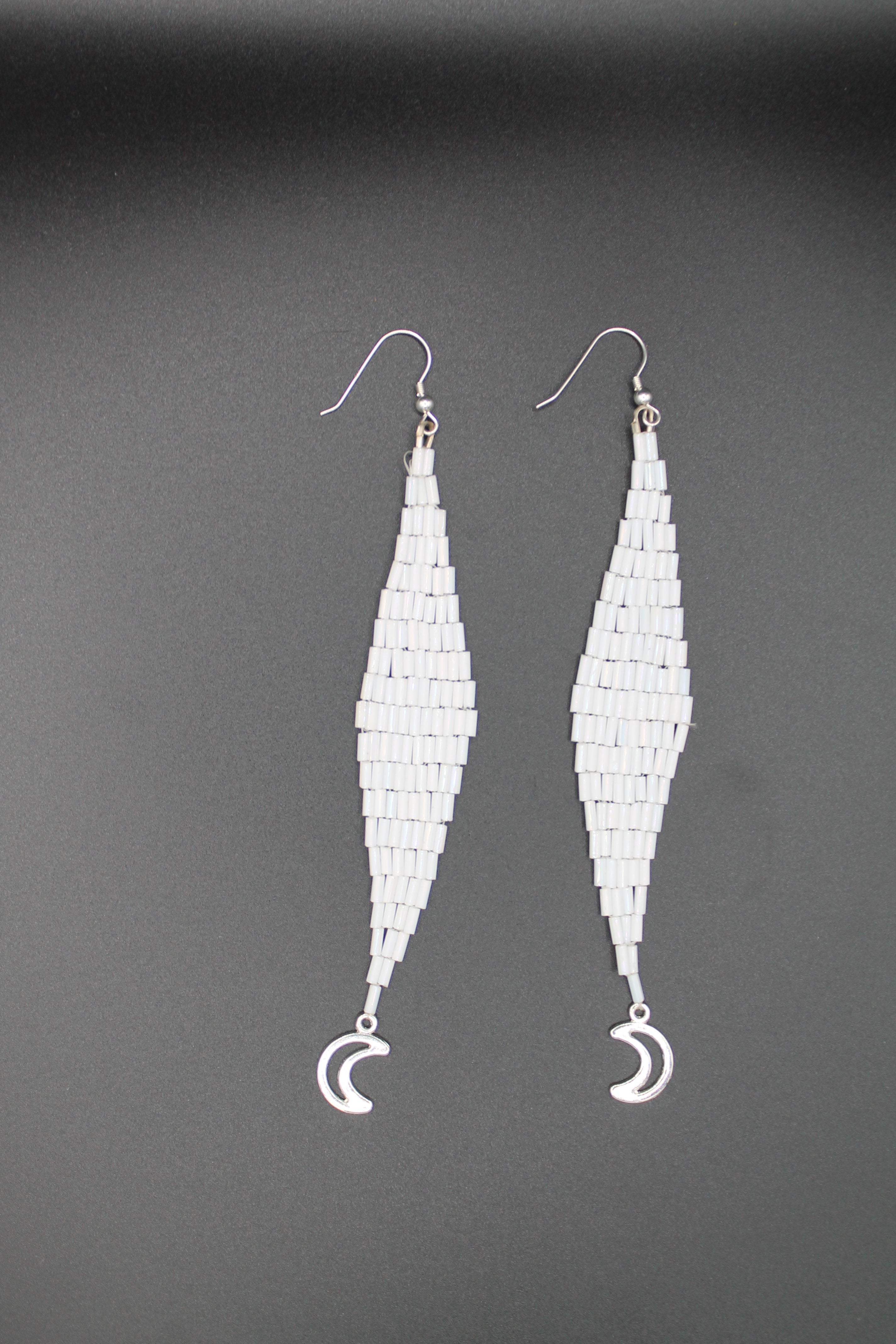 White moon lure earrings